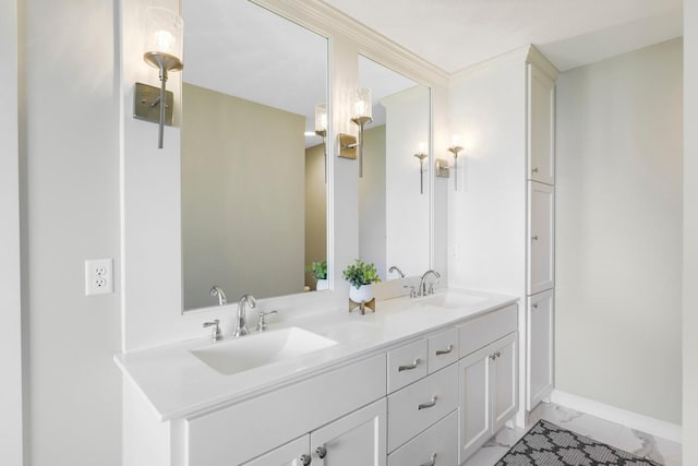 full bathroom with double vanity, a sink, and marble finish floor