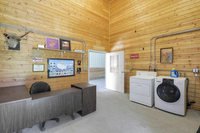 36090 Helium St NW, Wyanett Twp, MN 55371 - laundry area with washer and clothes dryer, wood walls, and a towering ceiling