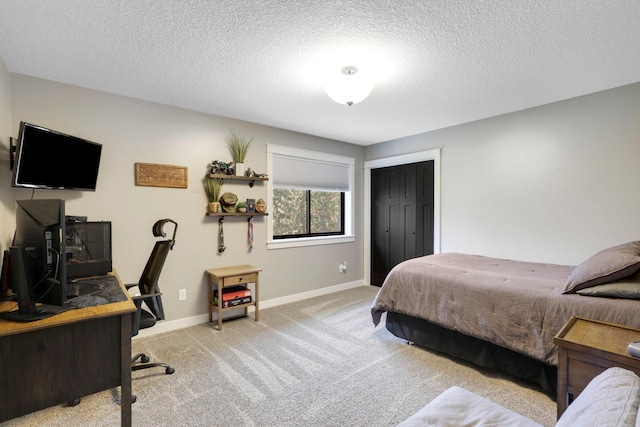 36090 Helium St NW, Wyanett Twp, MN 55371 - carpeted bedroom featuring a closet and a textured ceiling