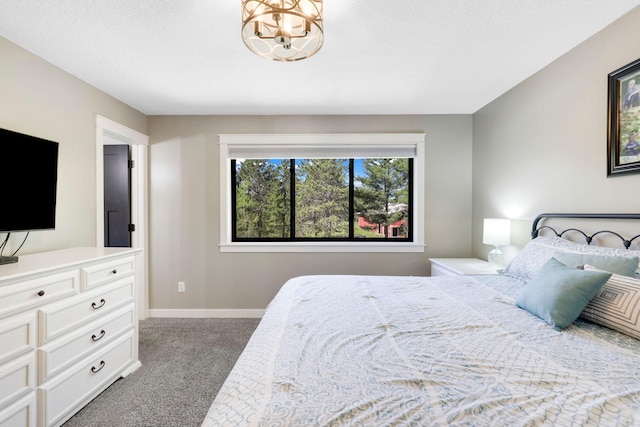 36090 Helium St NW, Wyanett Twp, MN 55371 - bedroom featuring carpet floors and a chandelier