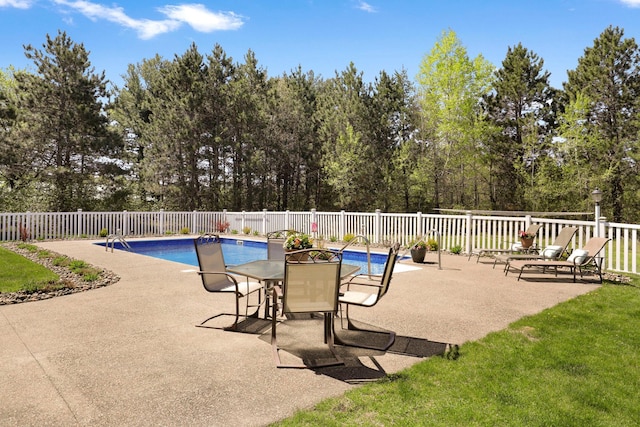 36090 Helium St NW, Wyanett Twp, MN 55371 - view of swimming pool featuring view of wooded area and a patio area