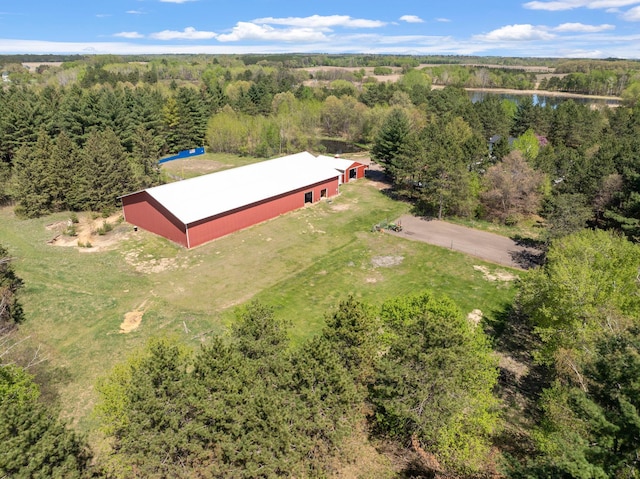 36090 Helium St NW, Wyanett Twp, MN 55371 - aerial view of property and surrounding area featuring a heavily wooded area and a nearby body of water