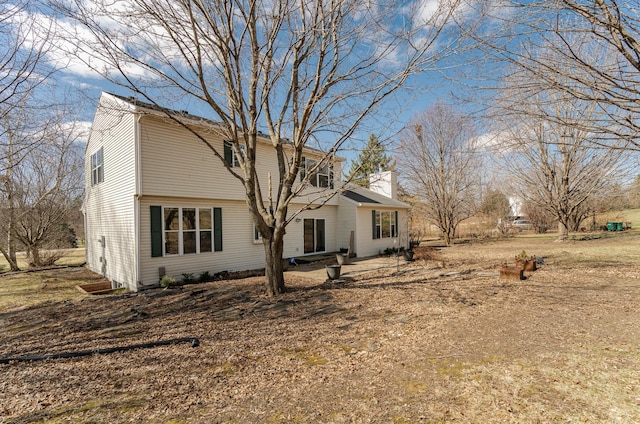 exterior space featuring a chimney