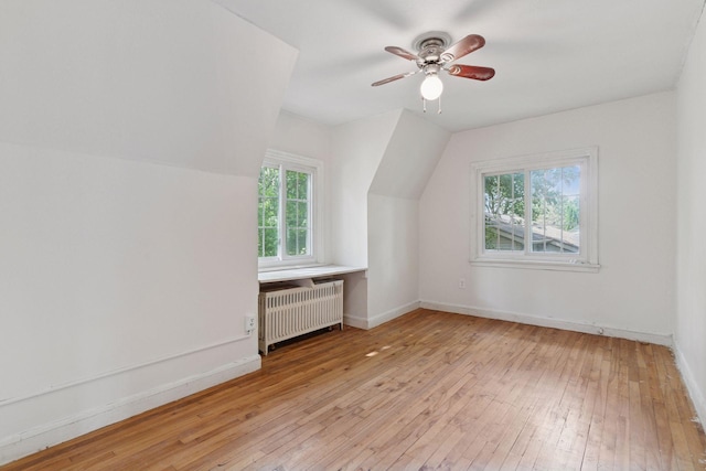 491 Burlington Rd, Saint Paul, MN 55119 - bonus room with radiator heating unit, light wood-style flooring, ceiling fan, and lofted ceiling