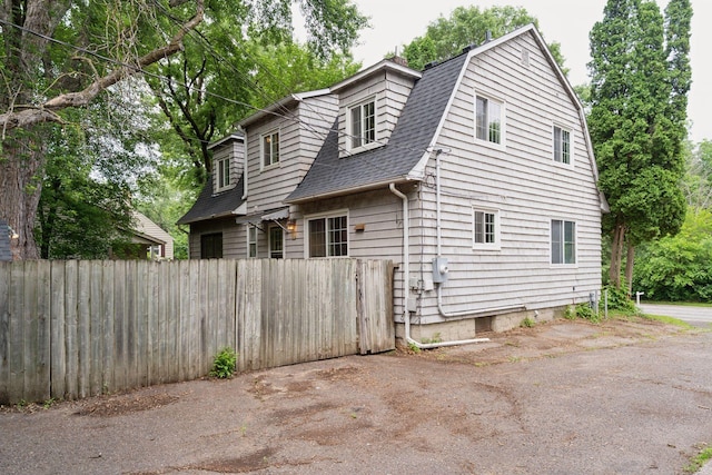 491 Burlington Rd, Saint Paul, MN 55119 - view of home's exterior featuring a shingled roof and a gambrel roof