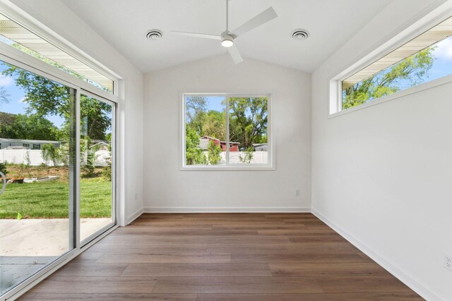 17729 Everest Ave, Lakeville, MN 55044 - empty room with plenty of natural light, wood finished floors, lofted ceiling, a ceiling fan, and baseboards