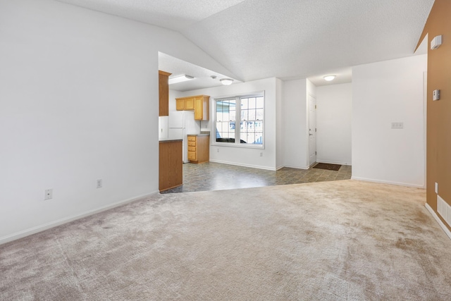 1065 Blackbird Trl SW Unit 8, Hutchinson, MN 55350 - unfurnished room featuring vaulted ceiling, baseboards, and carpet floors