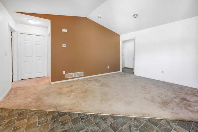 1065 Blackbird Trl SW Unit 8, Hutchinson, MN 55350 - spare room featuring lofted ceiling and carpet