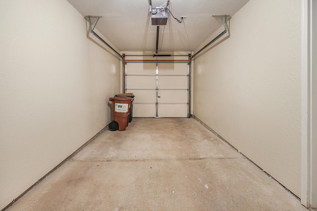 1065 Blackbird Trl SW Unit 8, Hutchinson, MN 55350 - garage featuring a garage door opener