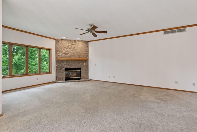 11765 177th St W, Lakeville, MN 55044 - unfurnished living room with a ceiling fan, carpet, ornamental molding, and a brick fireplace