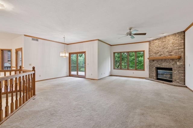 11765 177th St W, Lakeville, MN 55044 - unfurnished living room featuring plenty of natural light, a chandelier, a ceiling fan, carpet, and ornamental molding
