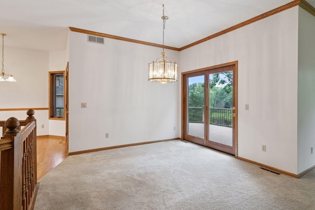 11765 177th St W, Lakeville, MN 55044 - spare room with a chandelier, carpet flooring, and ornamental molding