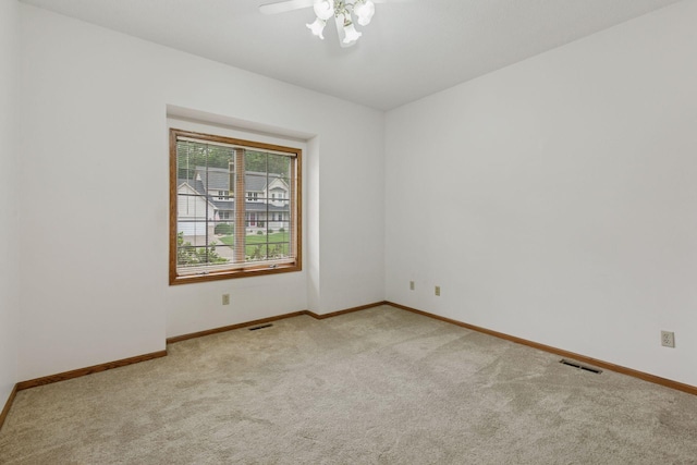 11765 177th St W, Lakeville, MN 55044 - carpeted spare room with baseboards and a ceiling fan