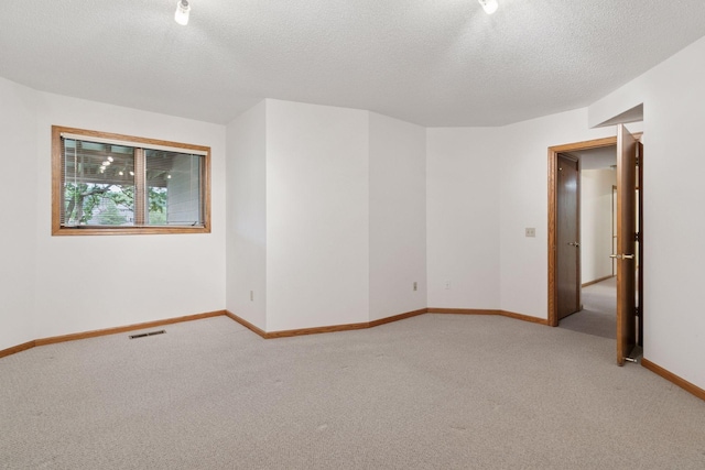 11765 177th St W, Lakeville, MN 55044 - carpeted spare room with a textured ceiling