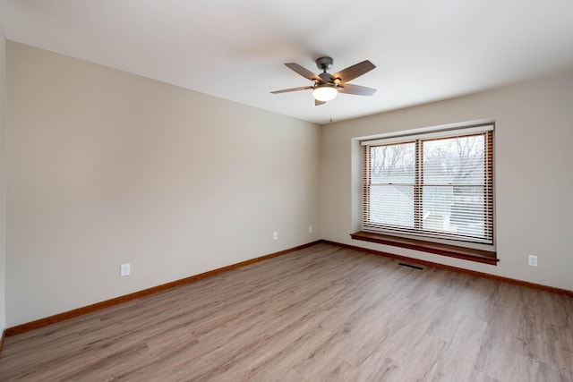 130 Teton Ln Unit 8, Mankato, MN 56001 - spare room featuring light wood finished floors and a ceiling fan