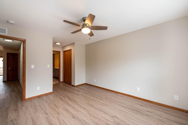 130 Teton Ln Unit 8, Mankato, MN 56001 - empty room with light wood-style floors, a ceiling fan, and a smoke detector