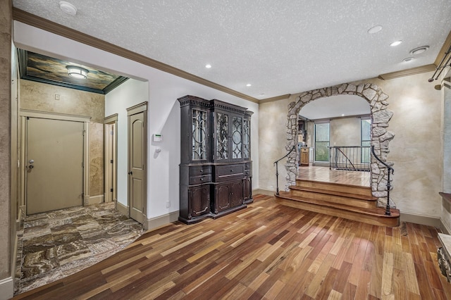 1801 Elliot Ave Unit 4And 6, Minneapolis, MN 55404 - entryway with wood-type flooring, baseboards, a textured ceiling, ornamental molding, and stairs