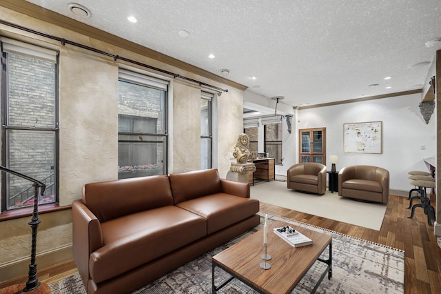 1801 Elliot Ave Unit 4And 6, Minneapolis, MN 55404 - living room with a textured ceiling, crown molding, baseboards, wood finished floors, and recessed lighting