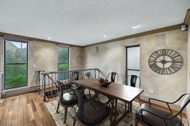 1801 Elliot Ave Unit 4And 6, Minneapolis, MN 55404 - dining room featuring ornamental molding, wood finished floors, a textured wall, a textured ceiling, and recessed lighting