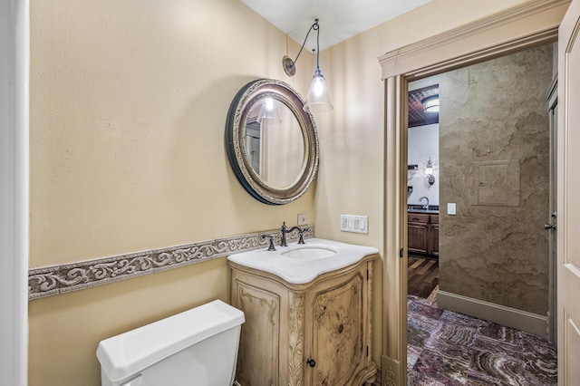 1801 Elliot Ave Unit 4And 6, Minneapolis, MN 55404 - half bath featuring toilet, vanity, and marble finish flooring
