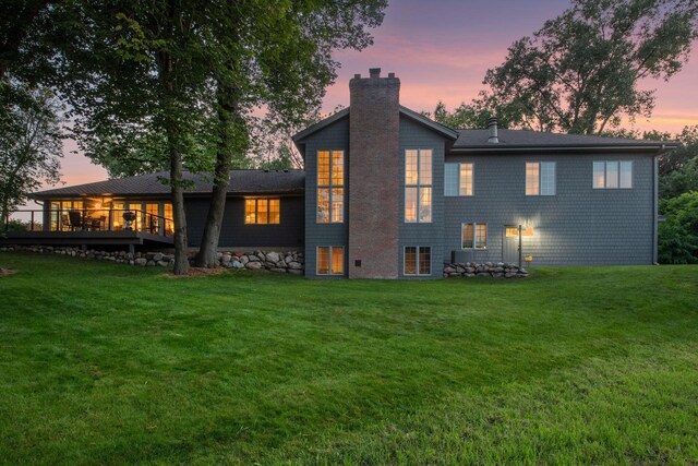 461 Peavey Ln, Wayzata, MN 55391 - back of property featuring a chimney and a yard