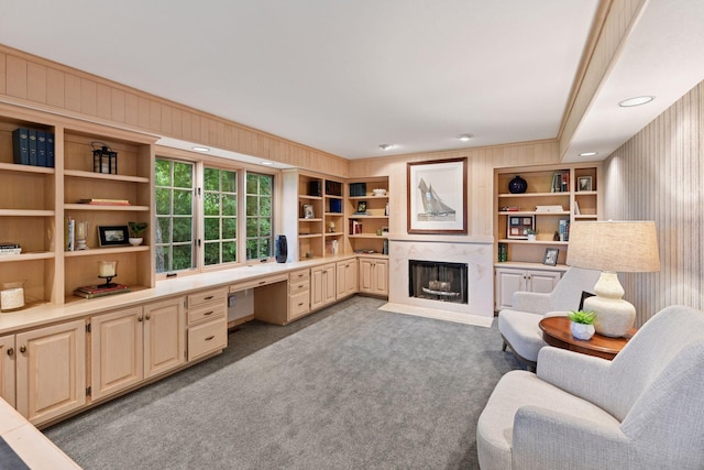 461 Peavey Ln, Wayzata, MN 55391 - carpeted living room with built in study area and a fireplace