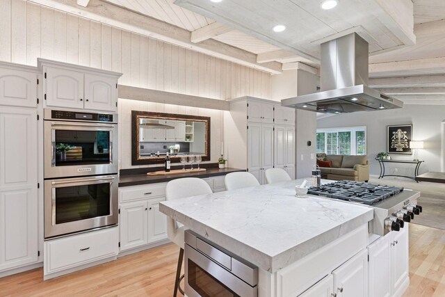 461 Peavey Ln, Wayzata, MN 55391 - kitchen with island range hood, appliances with stainless steel finishes, open floor plan, light wood-type flooring, and wooden ceiling