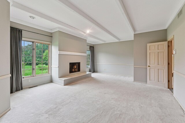 461 Peavey Ln, Wayzata, MN 55391 - unfurnished living room featuring carpet, beam ceiling, and a fireplace with raised hearth