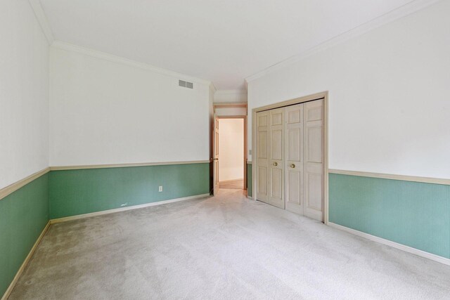 461 Peavey Ln, Wayzata, MN 55391 - unfurnished bedroom featuring ornamental molding, carpet, and a closet