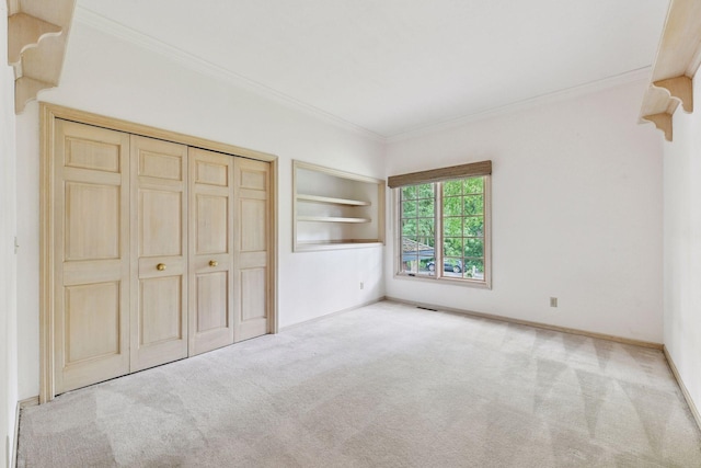 461 Peavey Ln, Wayzata, MN 55391 - unfurnished bedroom featuring carpet flooring, ornamental molding, and a closet
