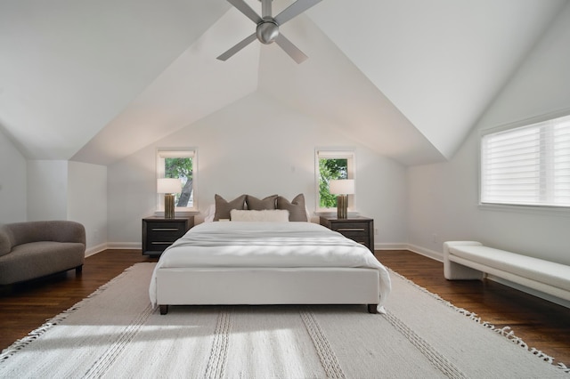 bedroom with wood finished floors, baseboards, a ceiling fan, and vaulted ceiling