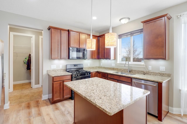 20024 Fern Glen Ln N, Forest Lake, MN 55025 - kitchen with black microwave, a sink, dishwasher, range with gas cooktop, and a kitchen island
