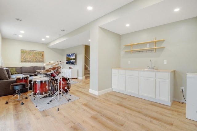 20024 Fern Glen Ln N, Forest Lake, MN 55025 - dining space with wet bar, stairway, light wood-style floors, baseboards, and recessed lighting