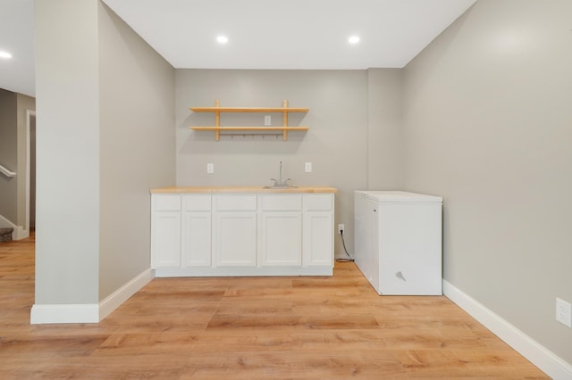 20024 Fern Glen Ln N, Forest Lake, MN 55025 - indoor wet bar with light wood-style flooring, baseboards, recessed lighting, and fridge