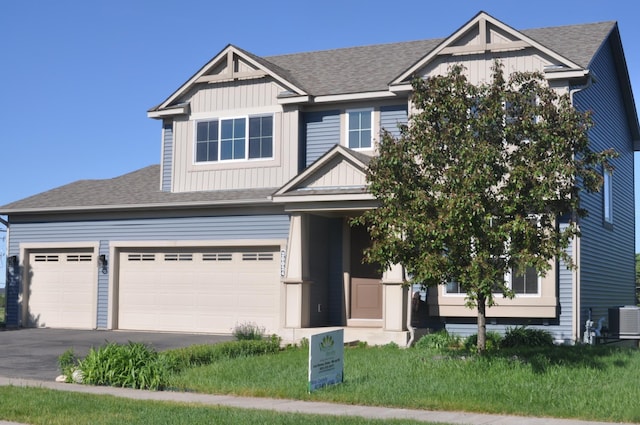 20024 Fern Glen Ln N, Forest Lake, MN 55025 - craftsman house with board and batten siding, asphalt driveway, and a shingled roof