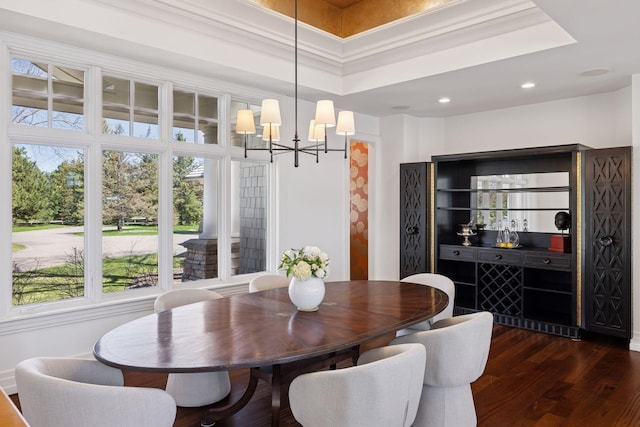 dining space featuring recessed lighting, a chandelier, and dark wood-style floors