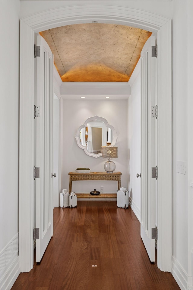 corridor with dark wood finished floors