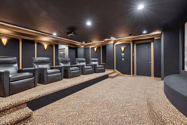 cinema room featuring crown molding, baseboards, carpet, and recessed lighting