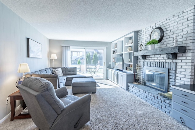 living room featuring a textured ceiling, light colored carpet, and a fireplace