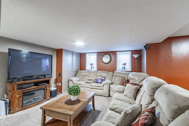 living area featuring carpet