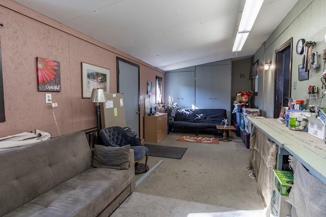 living room featuring vaulted ceiling