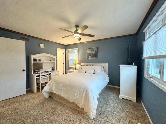bedroom with ornamental molding, ceiling fan, light carpet, and baseboards