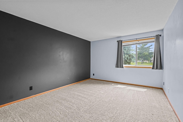 120 Demont Ave E Unit 103, Little Canada, MN 55117 - unfurnished room featuring carpet floors and baseboards