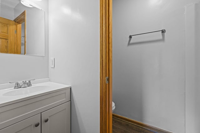 120 Demont Ave E Unit 103, Little Canada, MN 55117 - bathroom with vanity and wood finished floors