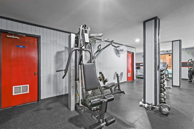 120 Demont Ave E Unit 103, Little Canada, MN 55117 - workout area with a textured ceiling