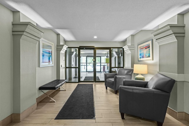 120 Demont Ave E Unit 103, Little Canada, MN 55117 - community lobby with recessed lighting and a textured ceiling
