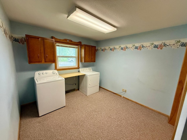 603 Maple Ave, Olivia, MN 56277 - laundry area with cabinet space, independent washer and dryer, and light carpet