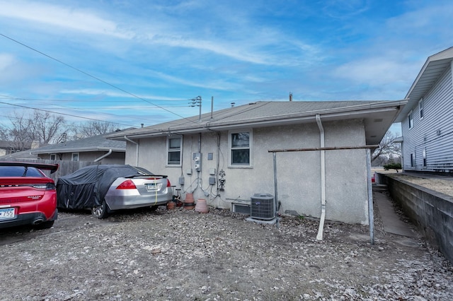 exterior space featuring stucco siding