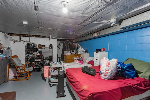 garage with concrete block wall