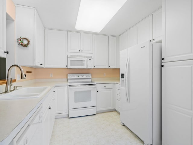 9323 Kimberly Ln N, Maple Grove, MN 55311 - kitchen with white appliances, white cabinets, light countertops, and light flooring